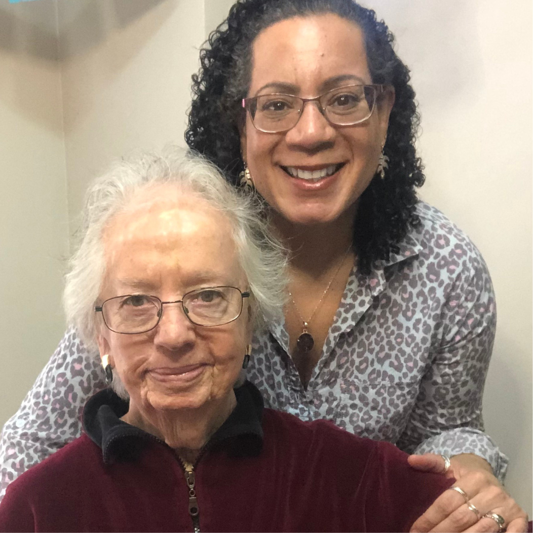 Photo of the author, Jill Hodge, standing behind her seated mother.