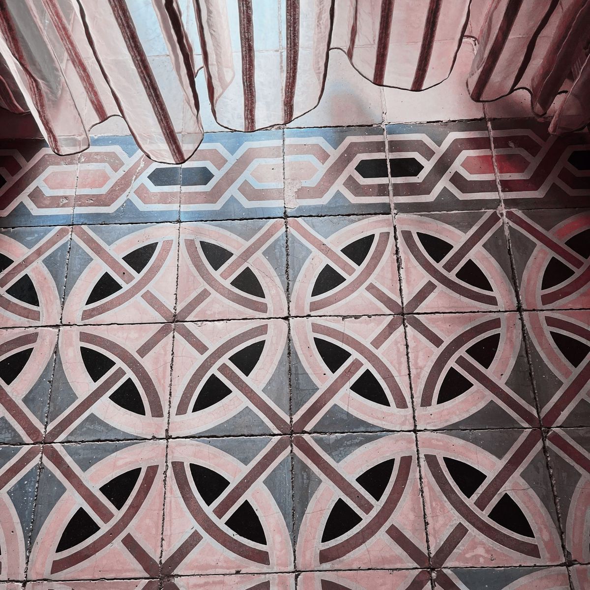 pink and brown mosaic tile floors in a Moroccan farmhouse