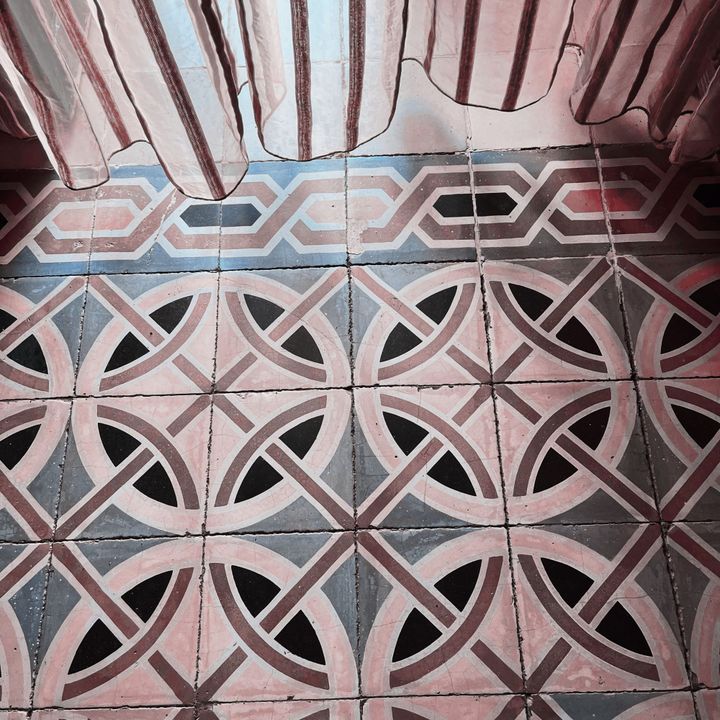 pink and brown mosaic tile floors in a Moroccan farmhouse