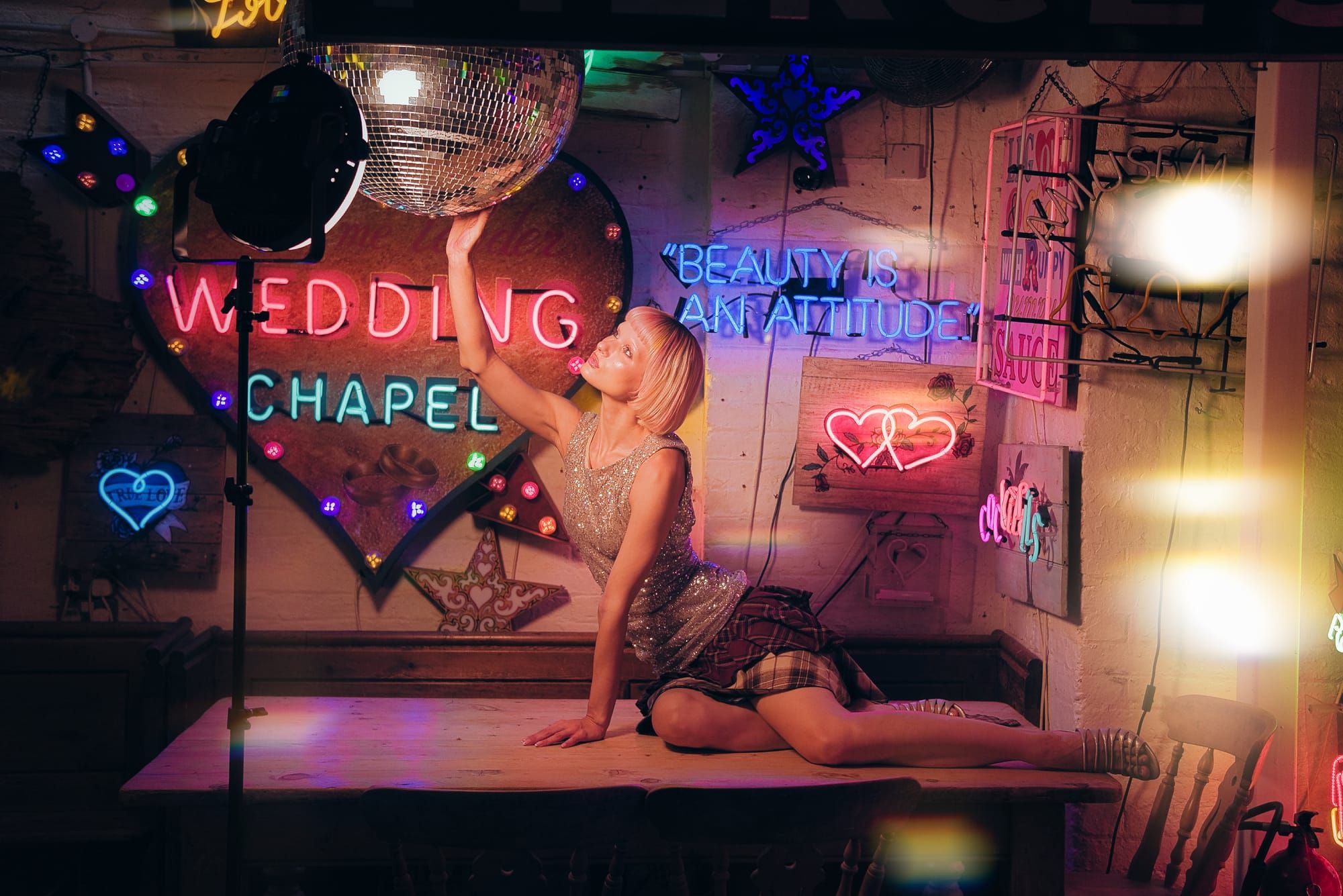 Neon lights and models - must be Gods Own Junkyard