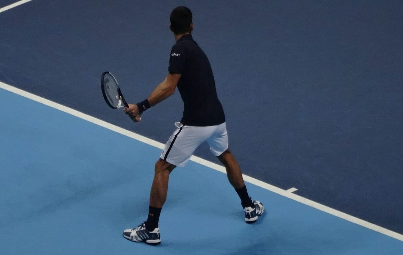 man playing tennis