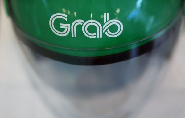 Grab dreht durch KI-Turbo: 30% schneller versenden, Jahresprognose angehoben