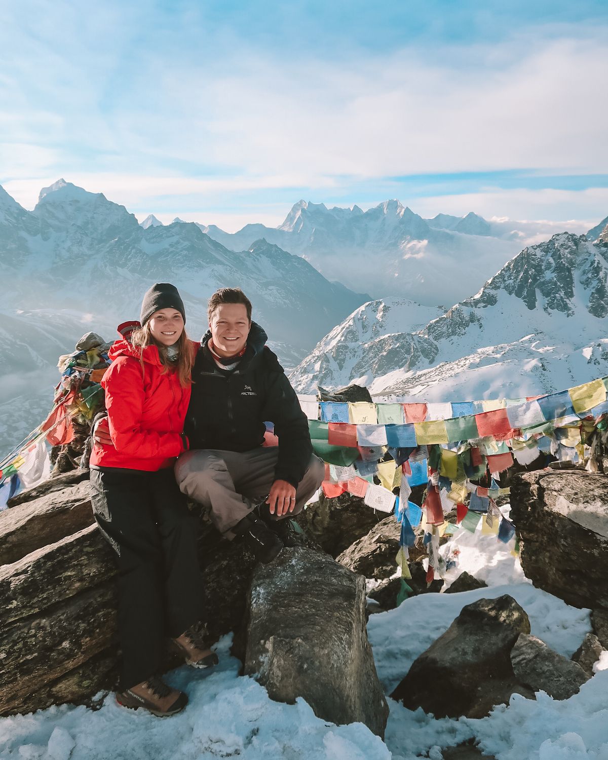 Cec and Ari posing for a picture at the summit of Gokyo Ri mountain in Nepal