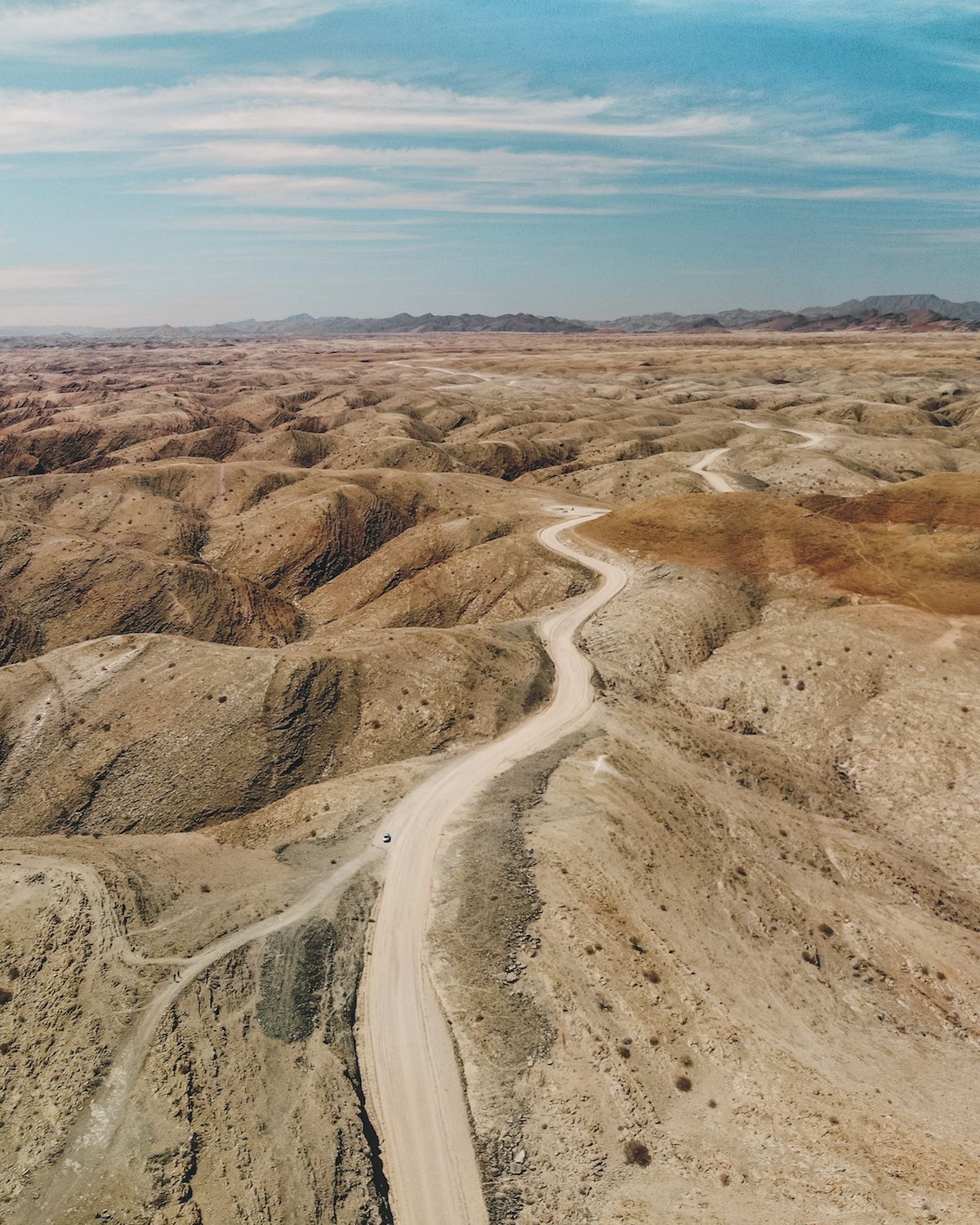 Cec and Ari's car spotted from a bird's eye view of Namibia's remote gravel roads