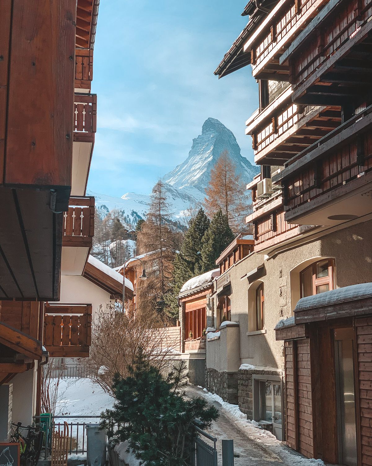 Snowy street view of Zermatt with the Matterhorn in the background