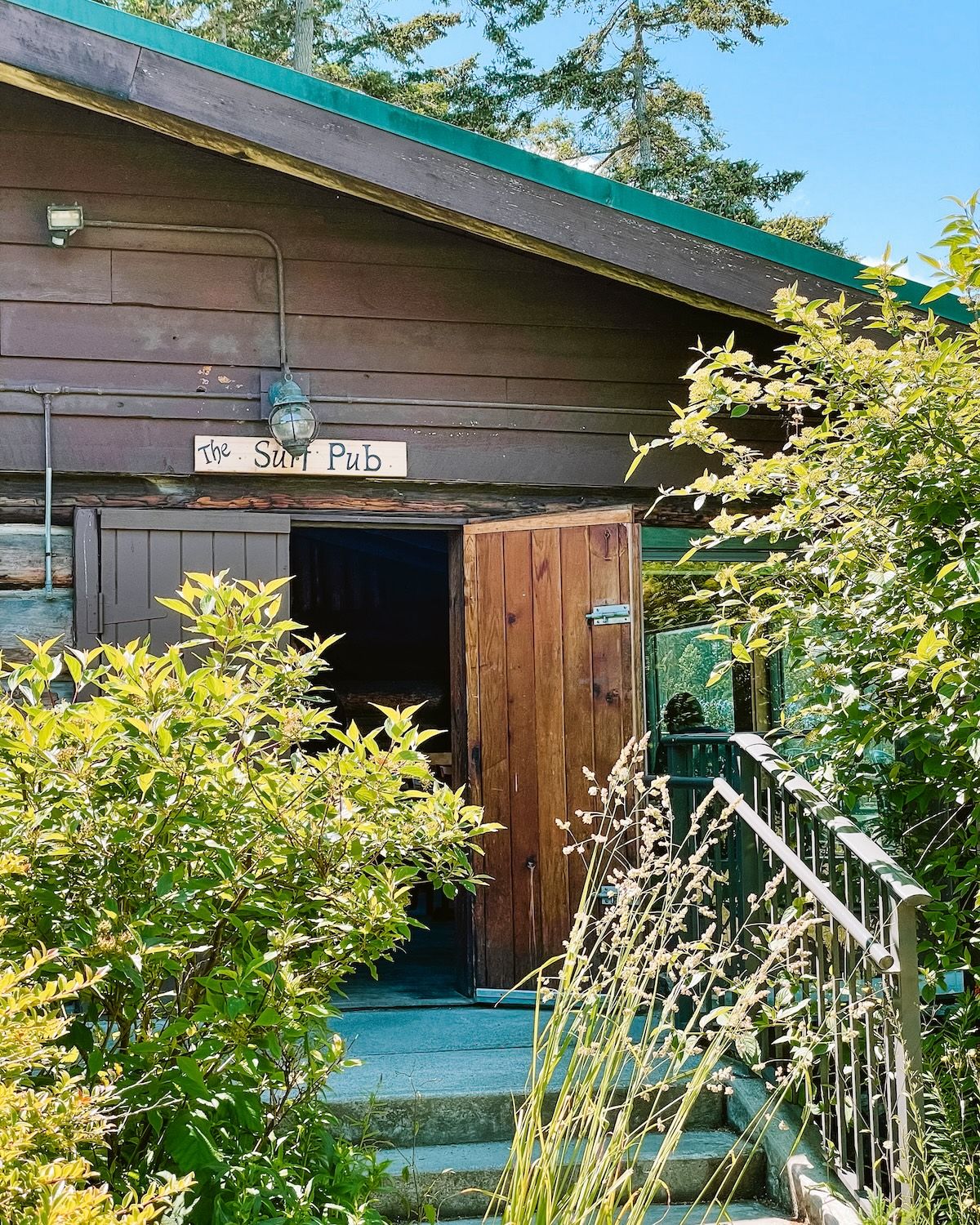 Outside view of the Surf Pub in an old log cabin on Gabriola Island