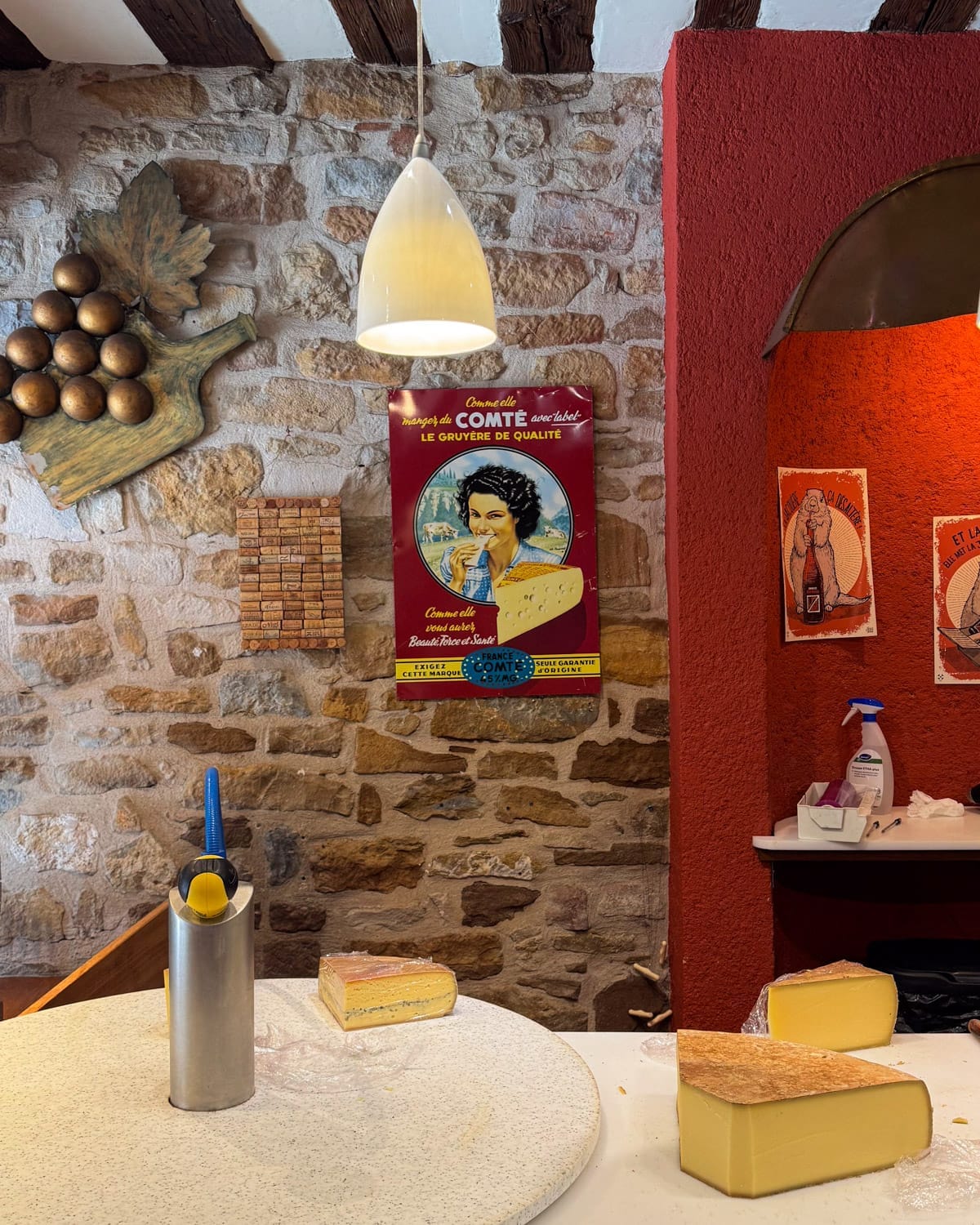 Comté cheese blocks at a traditional fromagerie in Poligny.