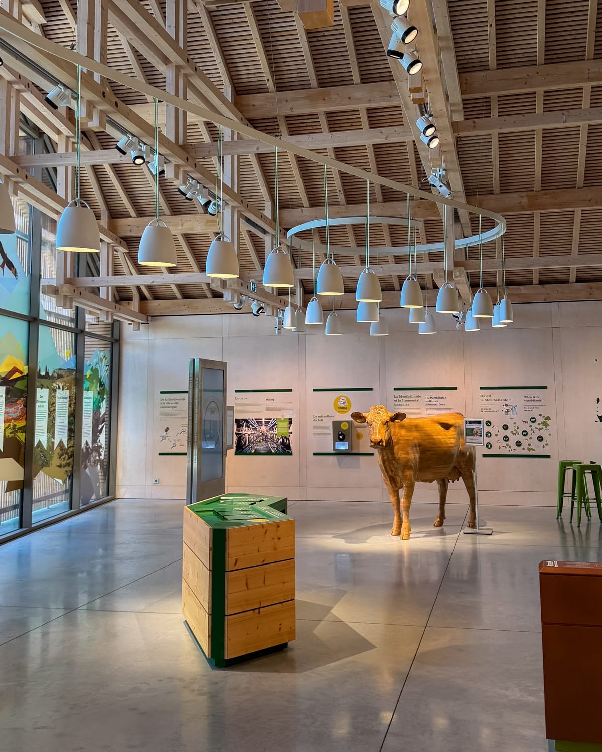 Interior of La Maison du Comté museum in Poligny with cow exhibit.