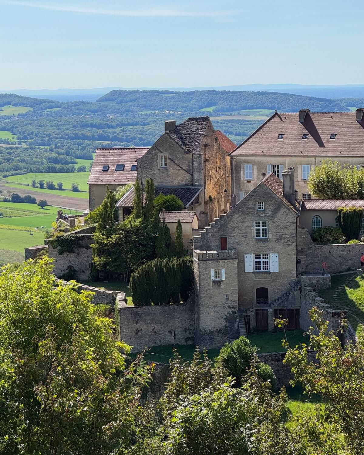 Hilltop village of Château-Chalon overlooking the rolling Jura countryside.