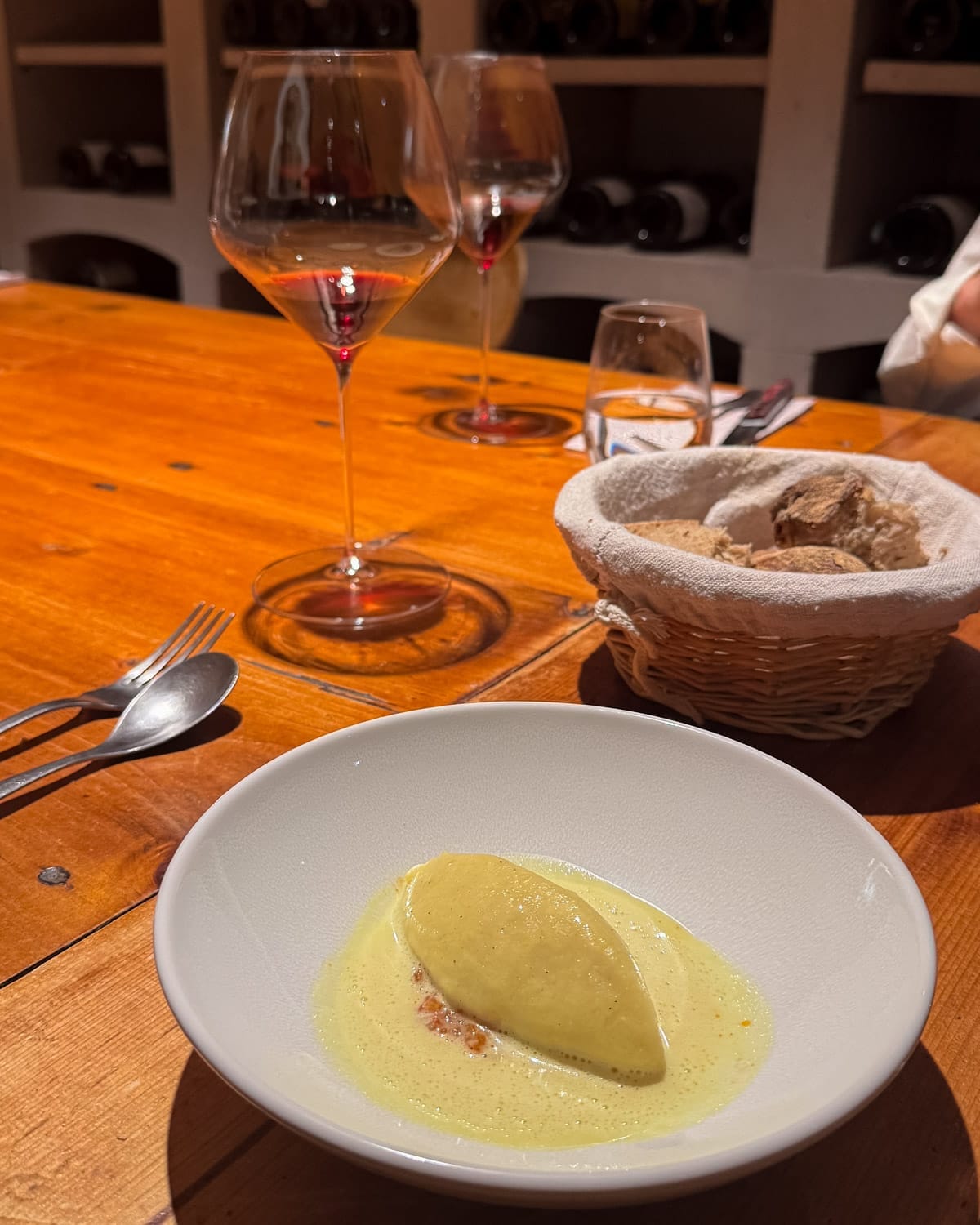 Prix fixe course served with Burgundy wine at Caves Madeleine in Beaune.