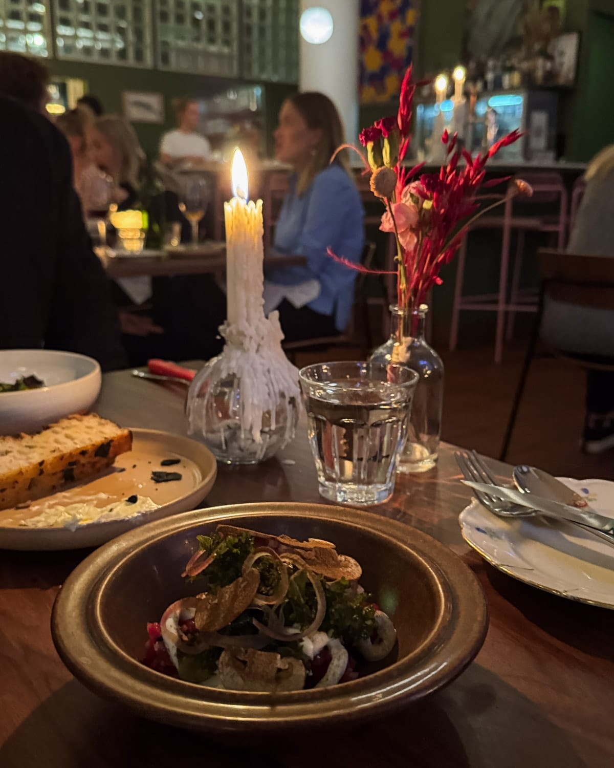 Candlelit dinner at 305 neighbourhood bistro in Helsinki, with a seasonal small plate.