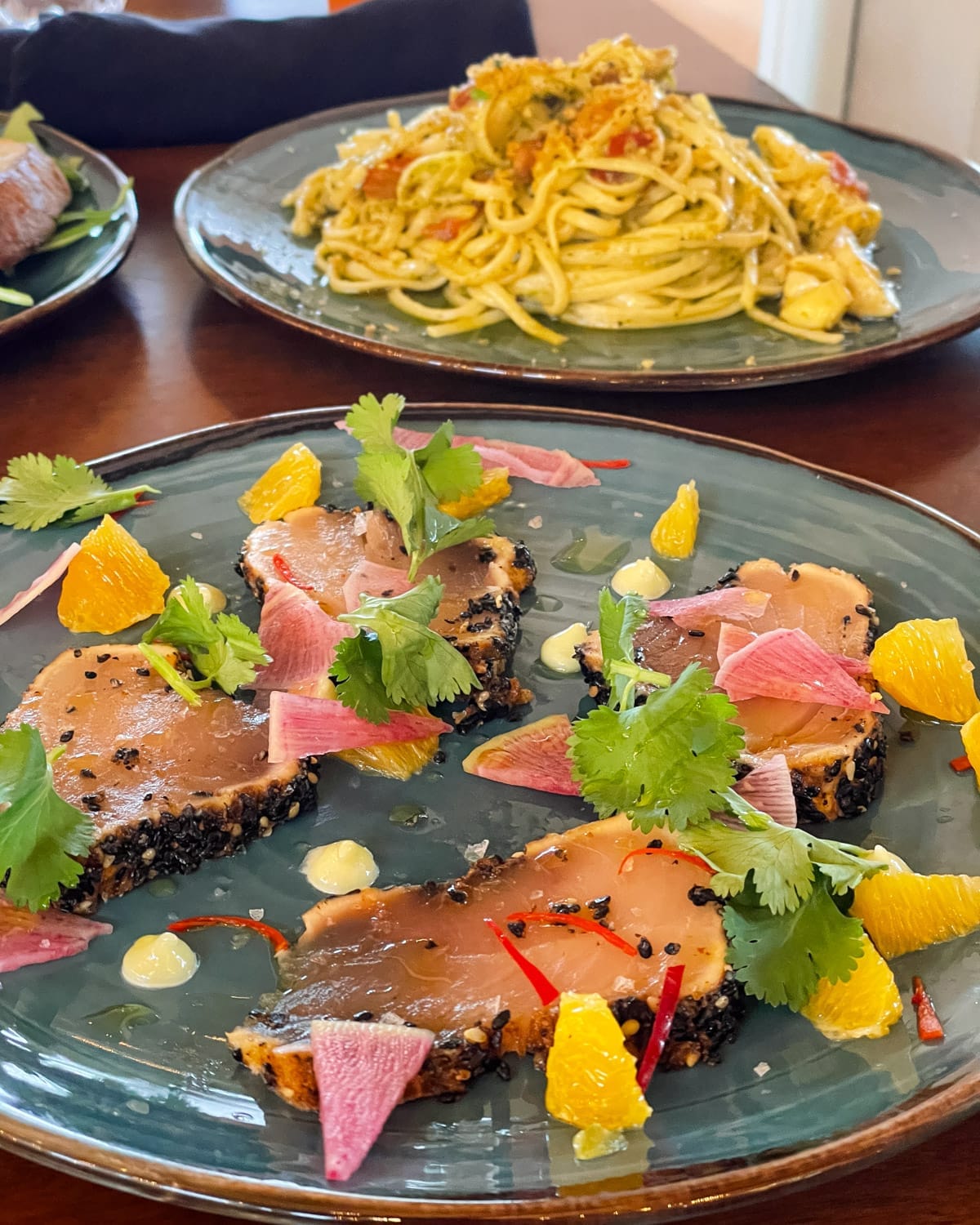Seared tuna appetizer with citrus, herbs, and pickled vegetables at The Breeze Restaurant on Hornby Island.