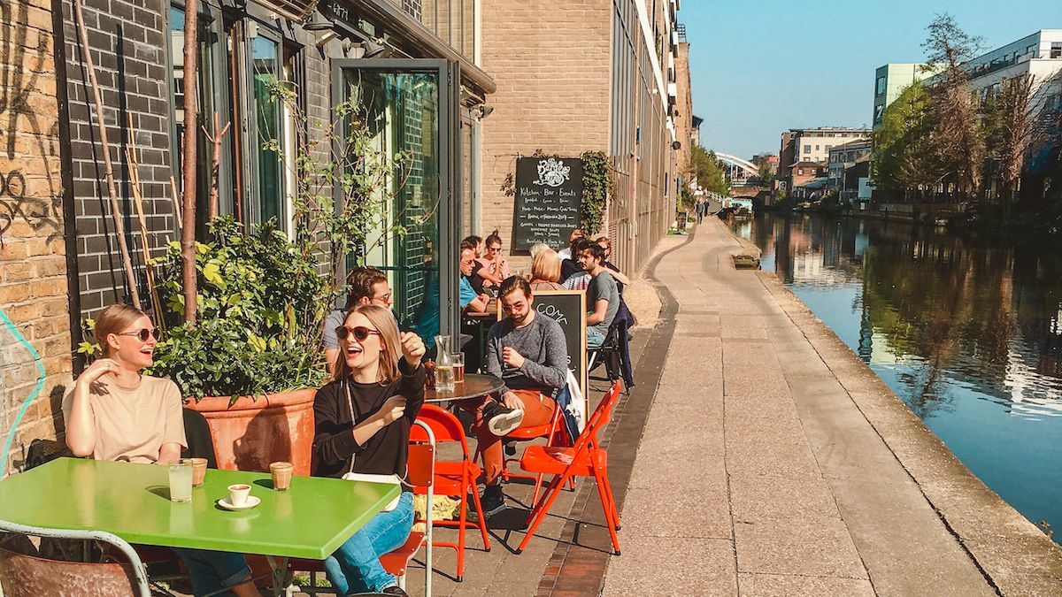 Cec and Katarina enjoying coffees along Regent's Canal at Towpath, one of London's best off the beaten path spots.