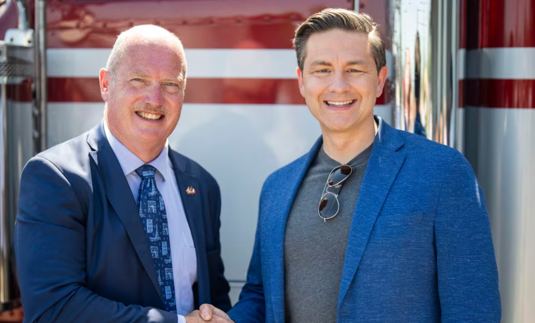 Mike de Jong (right) shaking hands with Conservative Party of Canada Leader Pierre Poilievre (left)