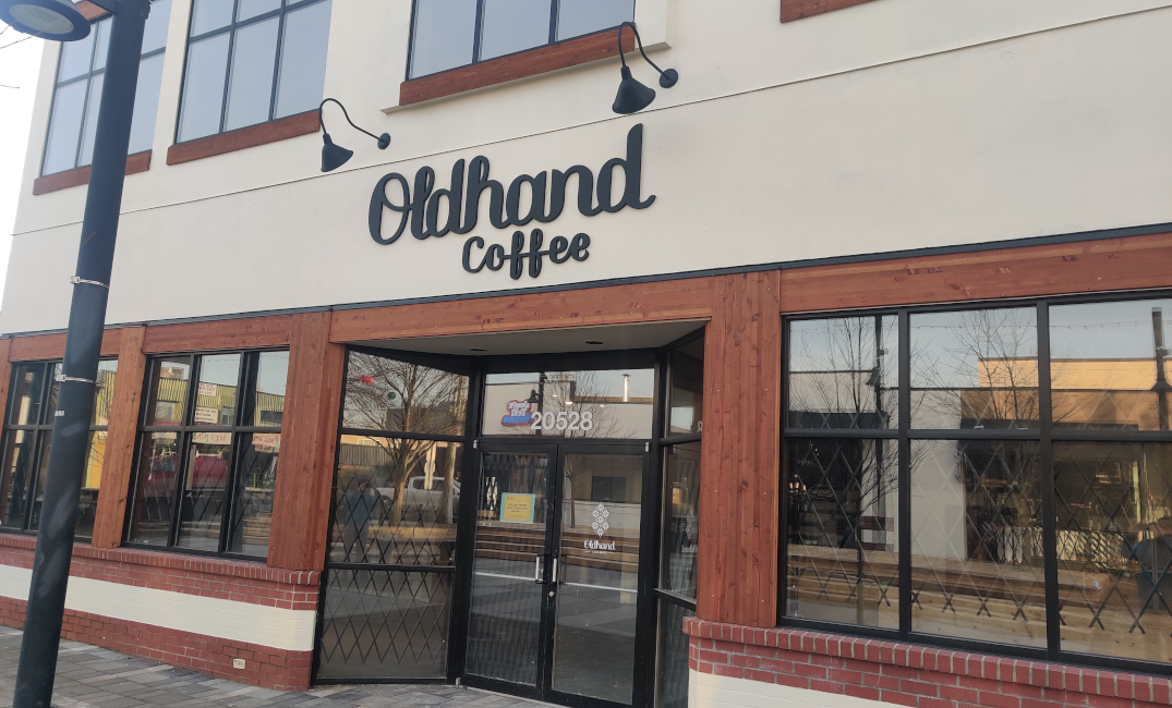 A photo of the storefront for the new Langley location of Oldhand Coffee