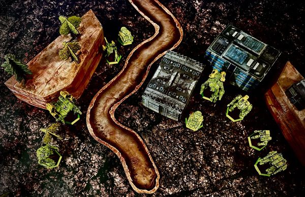 A Battletech scene with buildings and trees from Alpha Strike, and hills, ravines and mechs from Scouring Sands,