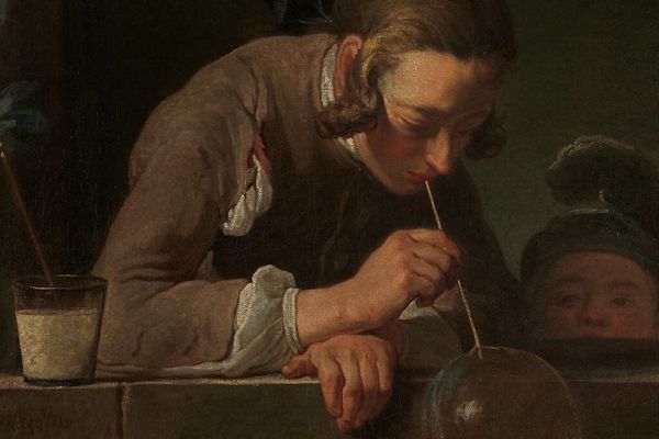 Jean Siméon Chardin, Soap Bubbles, ca. 1733–34. Oil on canvas. A young man in quiet concentration blows a single iridescent bubble. The Metropolitan Museum of Art, public domain.