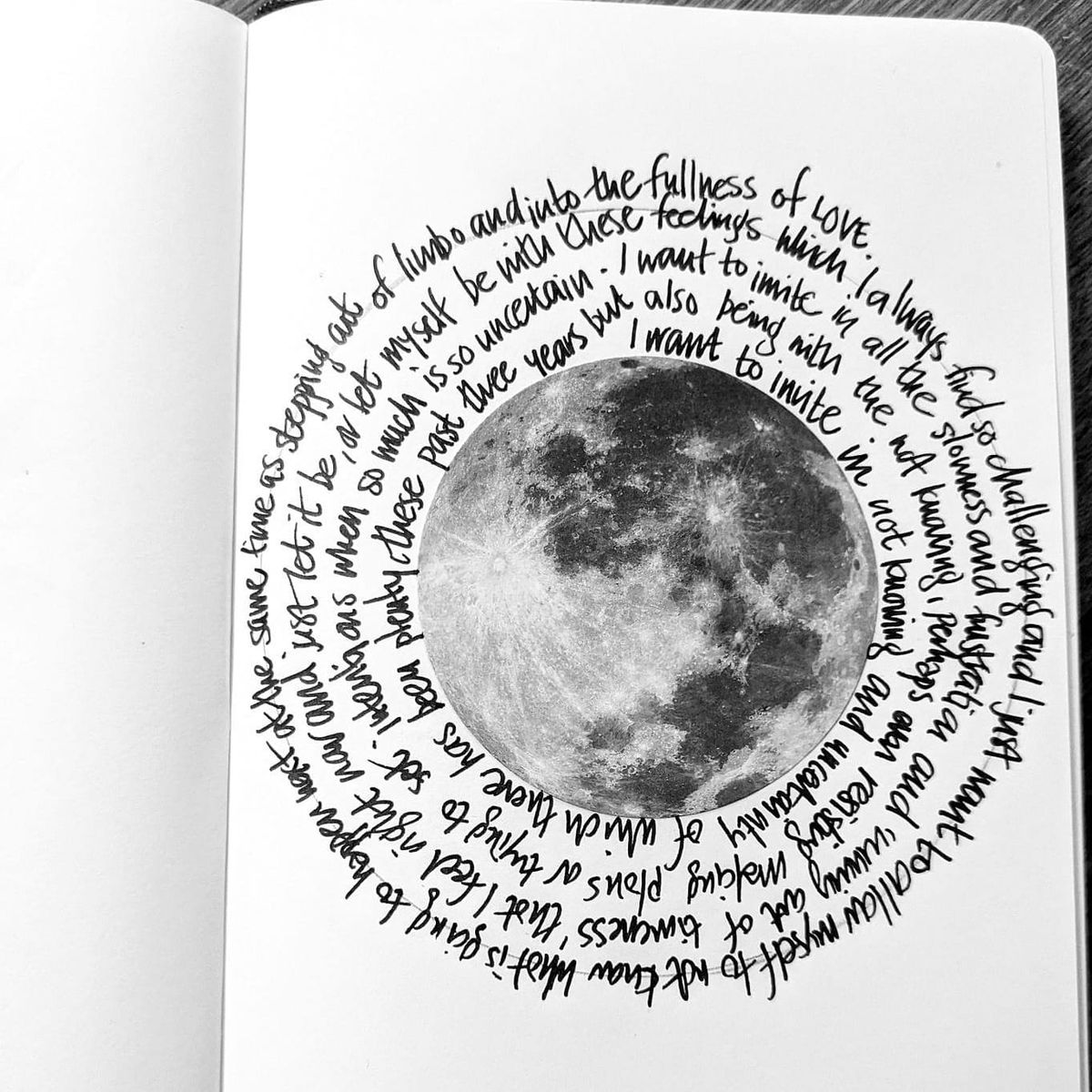 Spiral writing around a moon shape in a notebook by Sophie Nicholls
