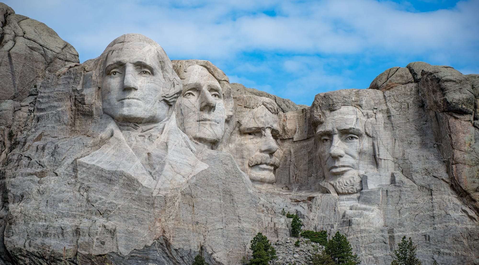 a group of presidents carved into the side of a mountain