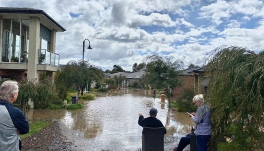 Flooded Rivervue Retirement Village in Melbourne was built one metre lower than approved