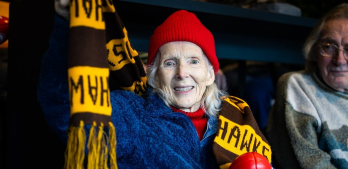 Aged care residents live it up at the footy in Foxtel’s corporate box