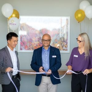 Centre: Colin Singh, CEO Arcare