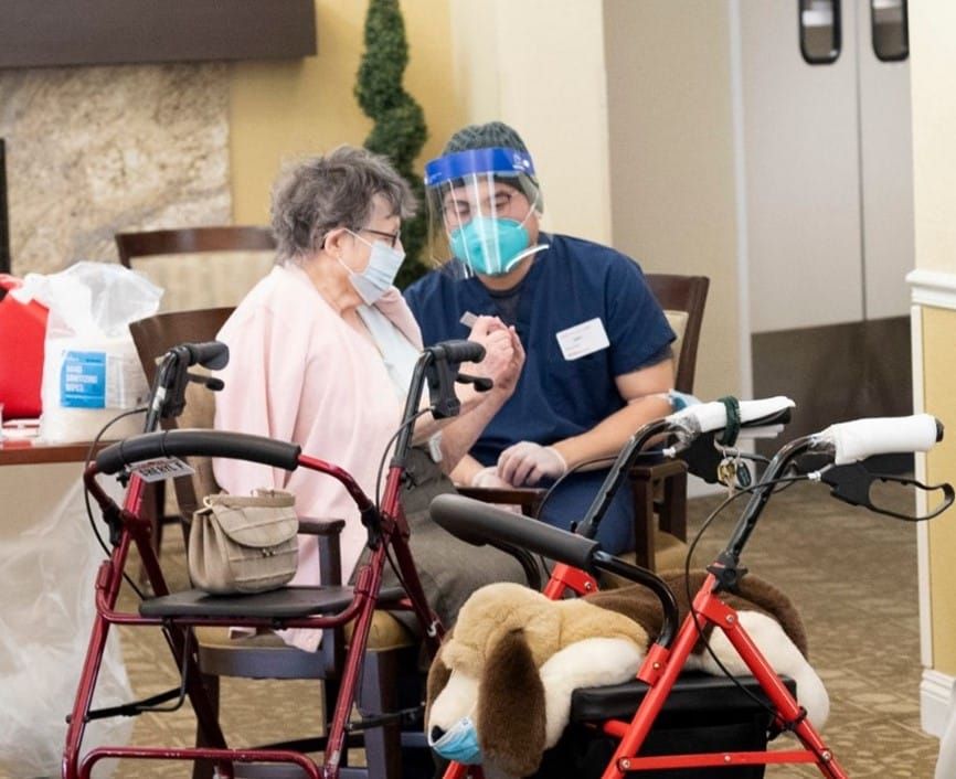 Only 38% of US aged care workers accept COVID vaccine as case numbers begin to drop post image