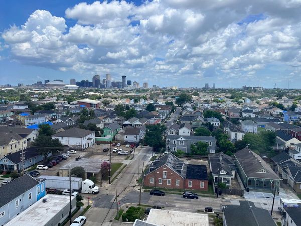 New Orleans skyline with houses in the foreground