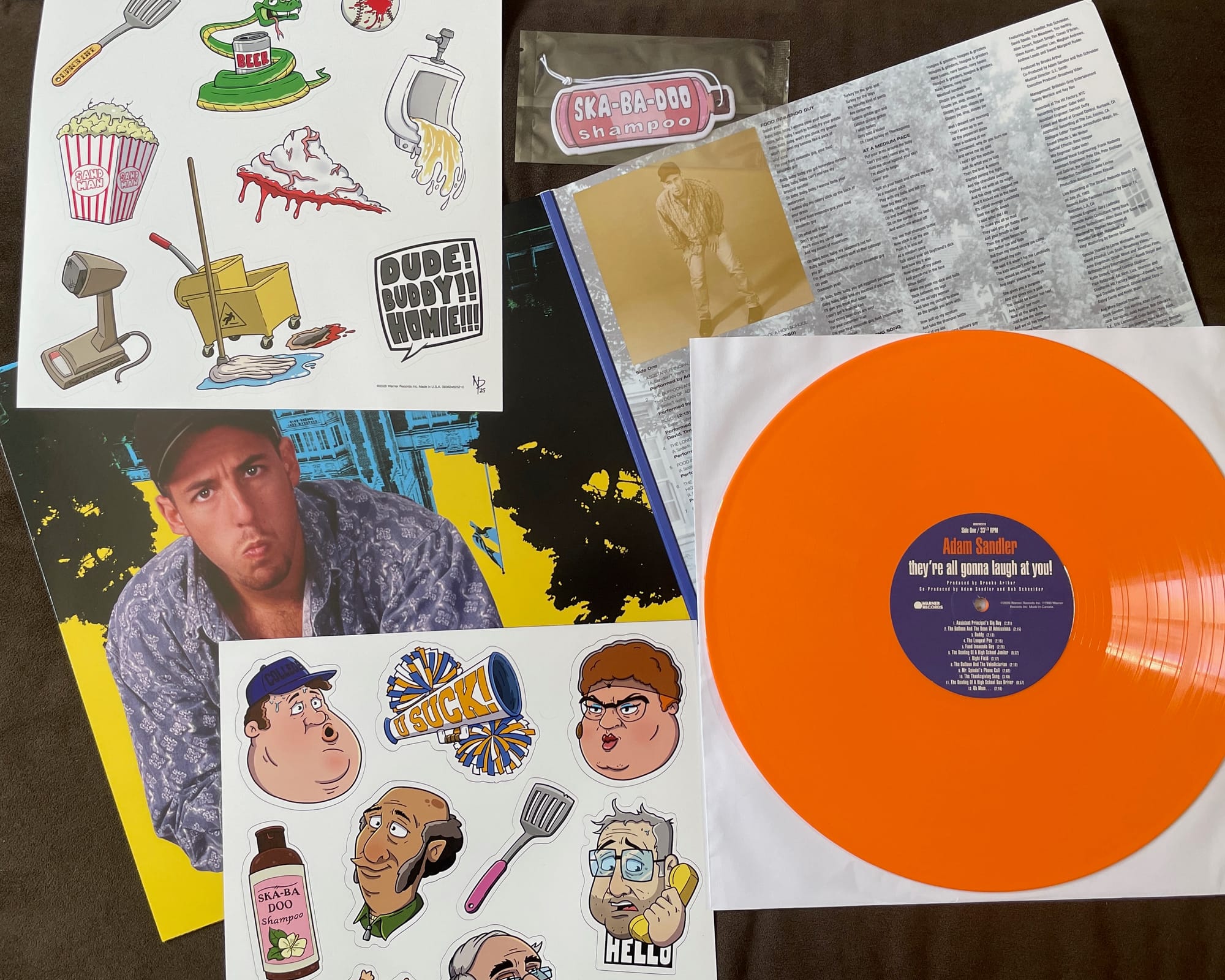 Inner gatefold, disc, sticker sheet, magnet sheet, and air freshener for Adam Sandler.