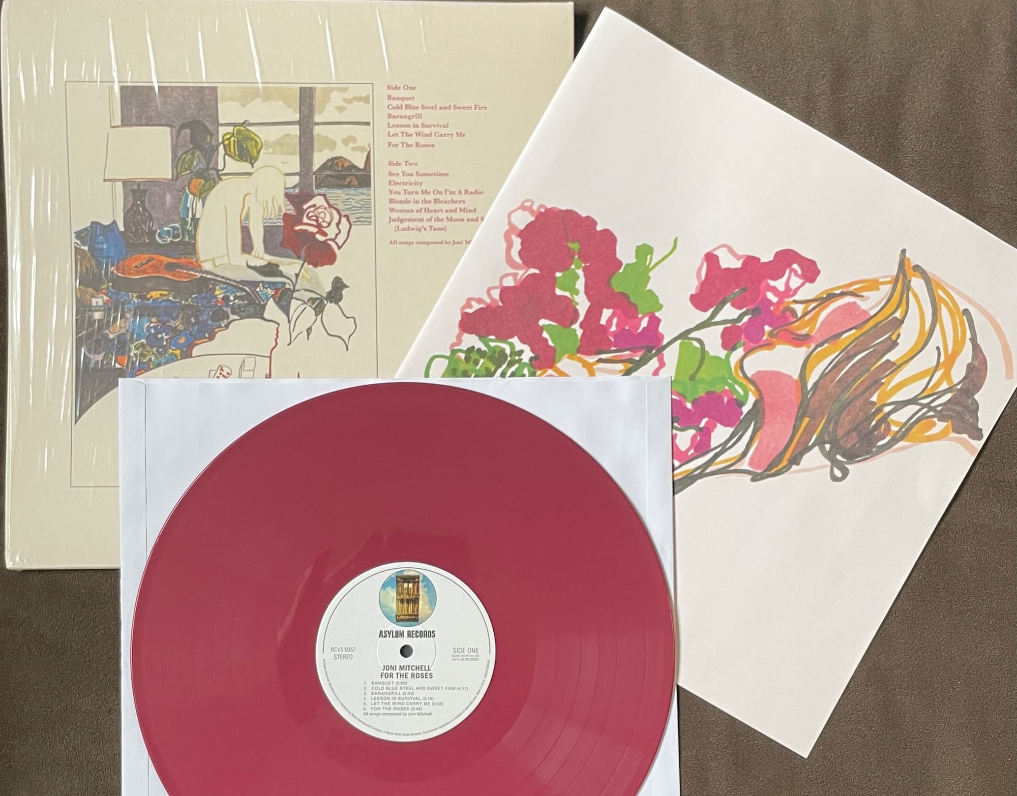 Back cover, insert, and disc for Joni Mitchell.