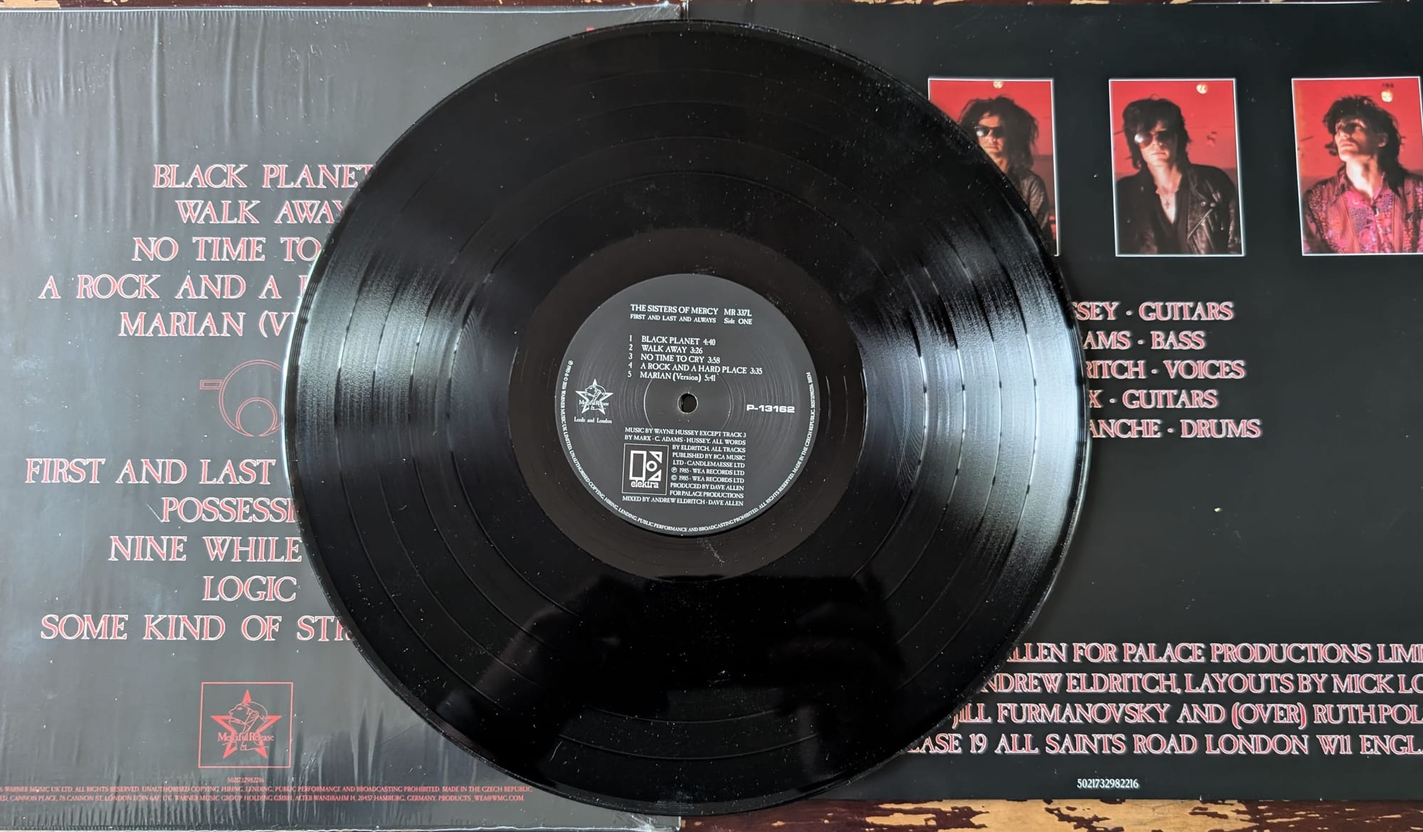 Back cover, inner sleeve, and disc for the Sisters of Mercury.