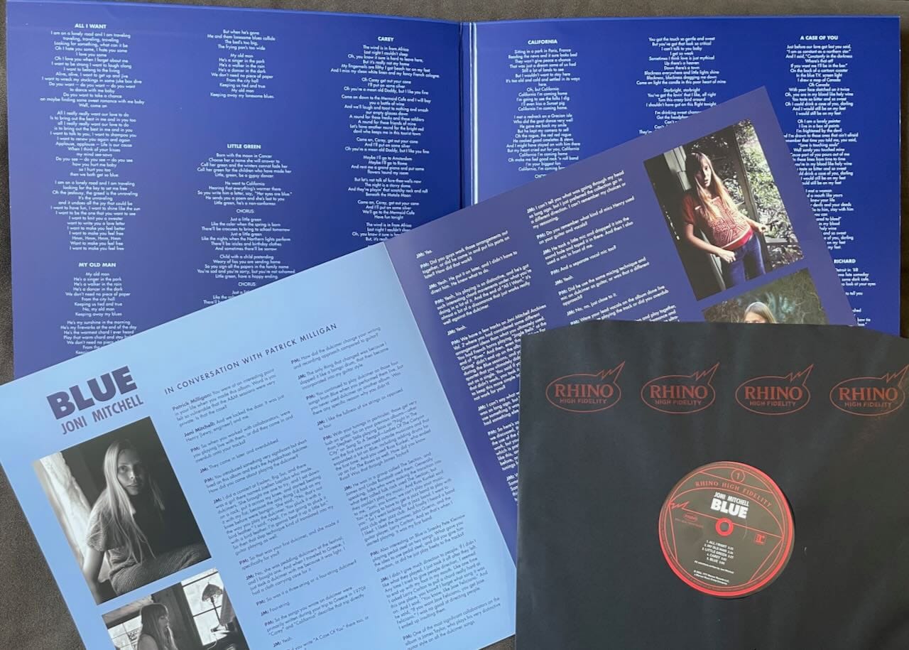 Inner gatefold, insert, and disc for Blue.