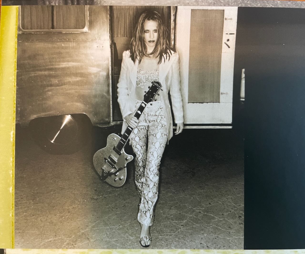 Photo of Sheryl Crow taken from the inner gatefold.