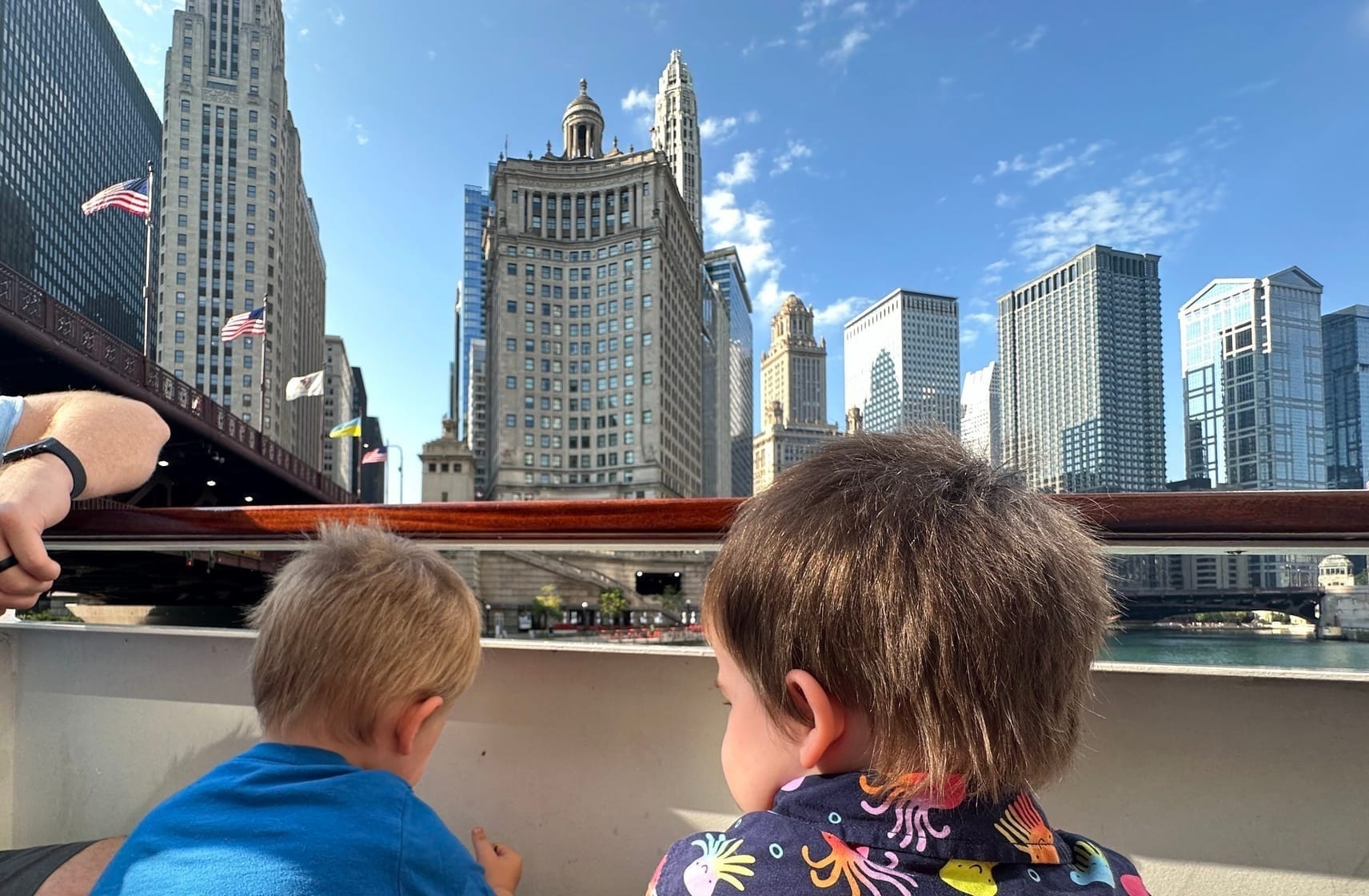 Kids on an architectural boat tour in Chicago during the summer