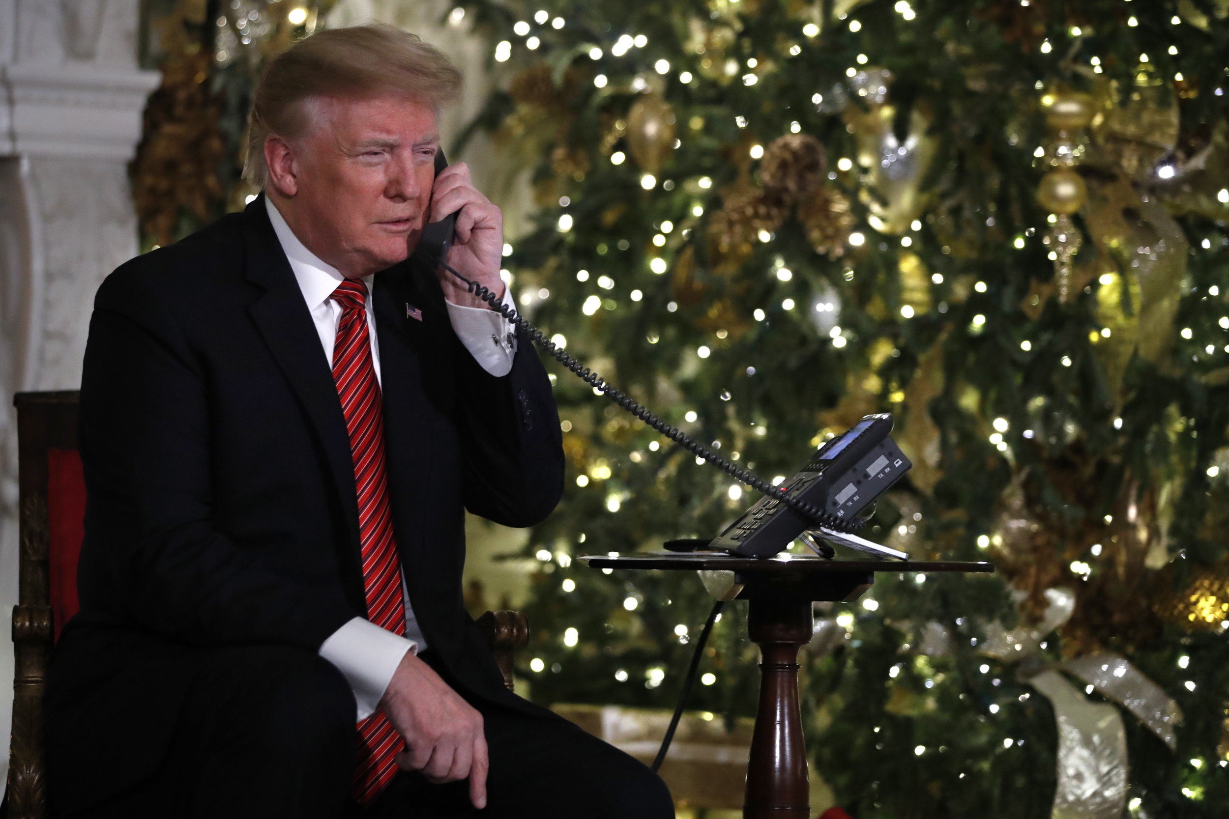   Trump in the White House, frightening children calling the NORAD Santa Tracker hotline, Christmas Eve, Monday, Dec. 24, 2018. (AP Photo/Jacquelyn Martin)  