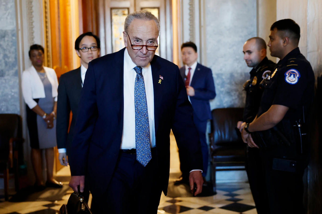  Senate Majority Leader Chuck Schumer (D-NY) departs from the Senate Chambers in the US Capitol Building on March 14, 2024 in Washington, DC. (Anna Moneymaker/Getty Images/AFP). Used without permission. 