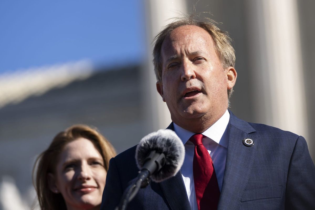 Texas Attorney General Ken Paxton speaks outside the U.S. Supreme Court