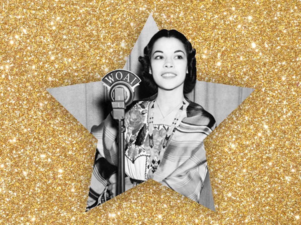 An image of Rosita Fernandez singing into a microphone on a glittering gold background