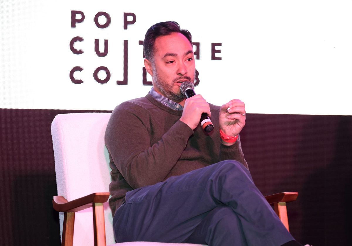 Joaquin Castro speaks on stage into a microphone
