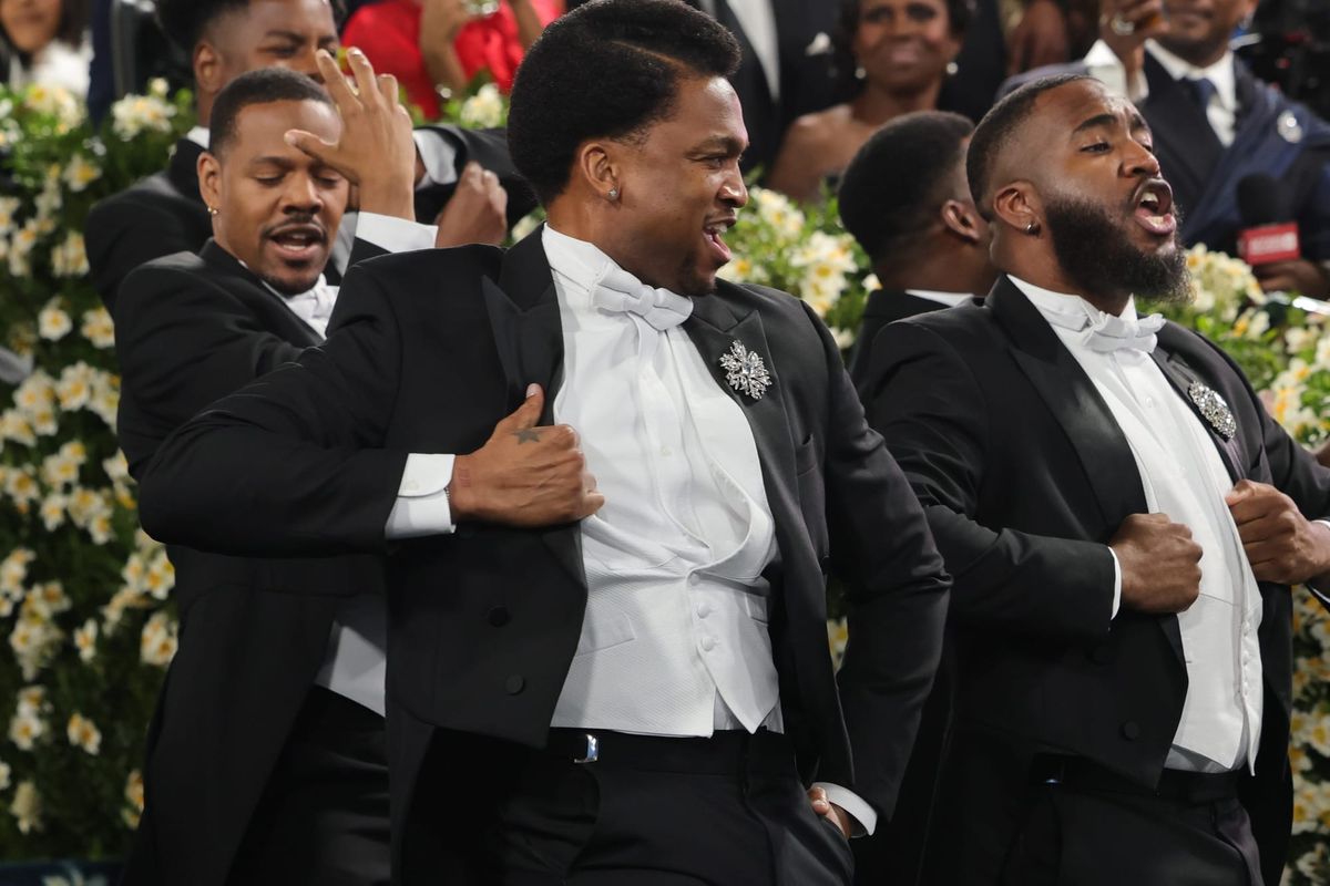 An a cappella gospel choir performs during the 2025 Met Gala celebrating "Superfine: Tailoring Black Style.” (Photo by Savion