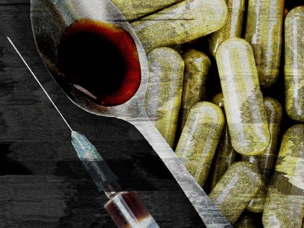 a needle and a spoon and a bunch of pills