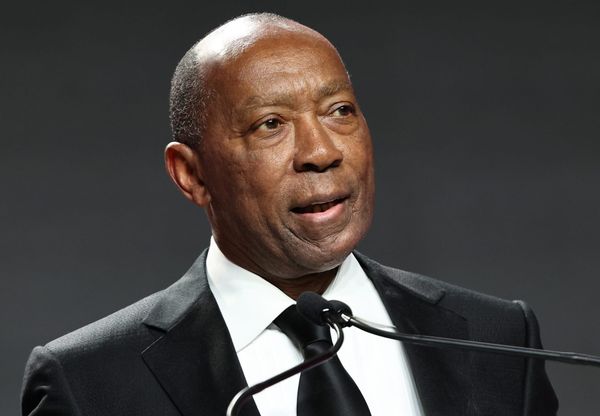 Sylvester Turner speaking at a podium