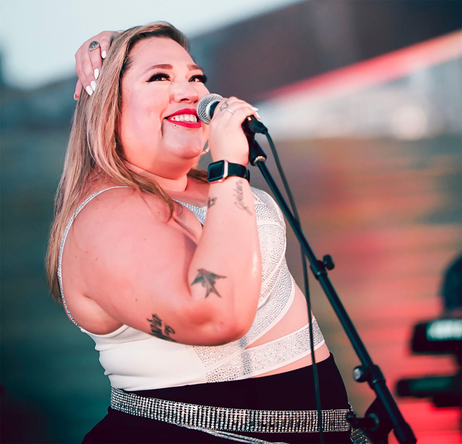 Stephanie Bergara singing onstage