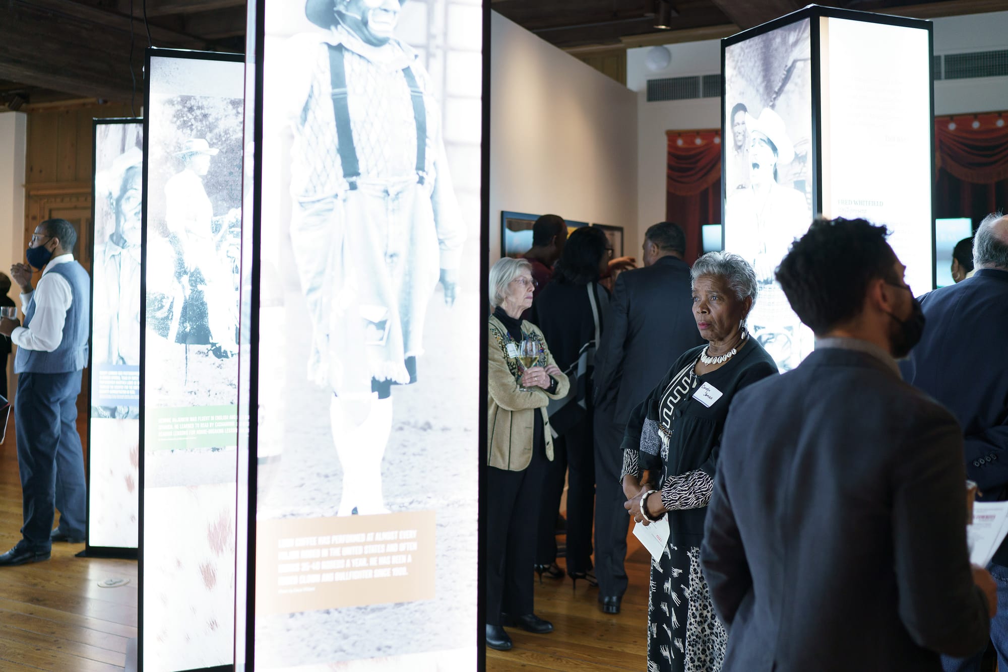 Viewers at the Witte Museum’s exhibit on Black Cowboys