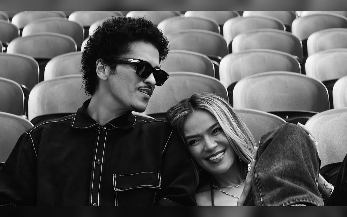 Karol G and Bruno Mars Fill a Stadium With Love in ‘Still’ Video