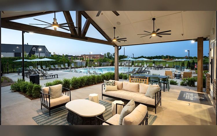 Images: Mixed-use ‘The Trails’ project debuts multifamily component