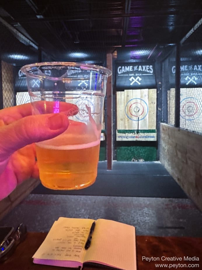 A hand holding a plastic cup with a drink in it

AI-generated content may be incorrect.