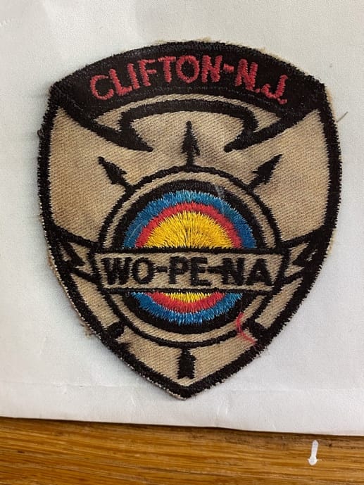 A patch of a badge

AI-generated content may be incorrect.
