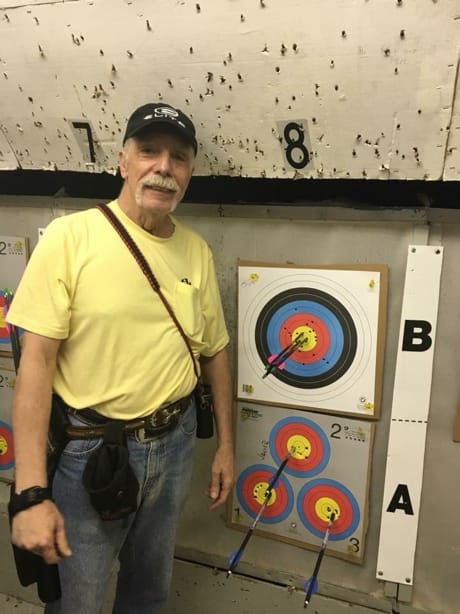 A person standing next to a target

AI-generated content may be incorrect.