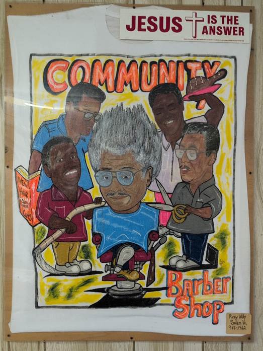 A caricature displayed inside Community Barber Shop depicts the barbers and the personality of the shop. The artwork remained part of the familiar interior seen by generations of customers.